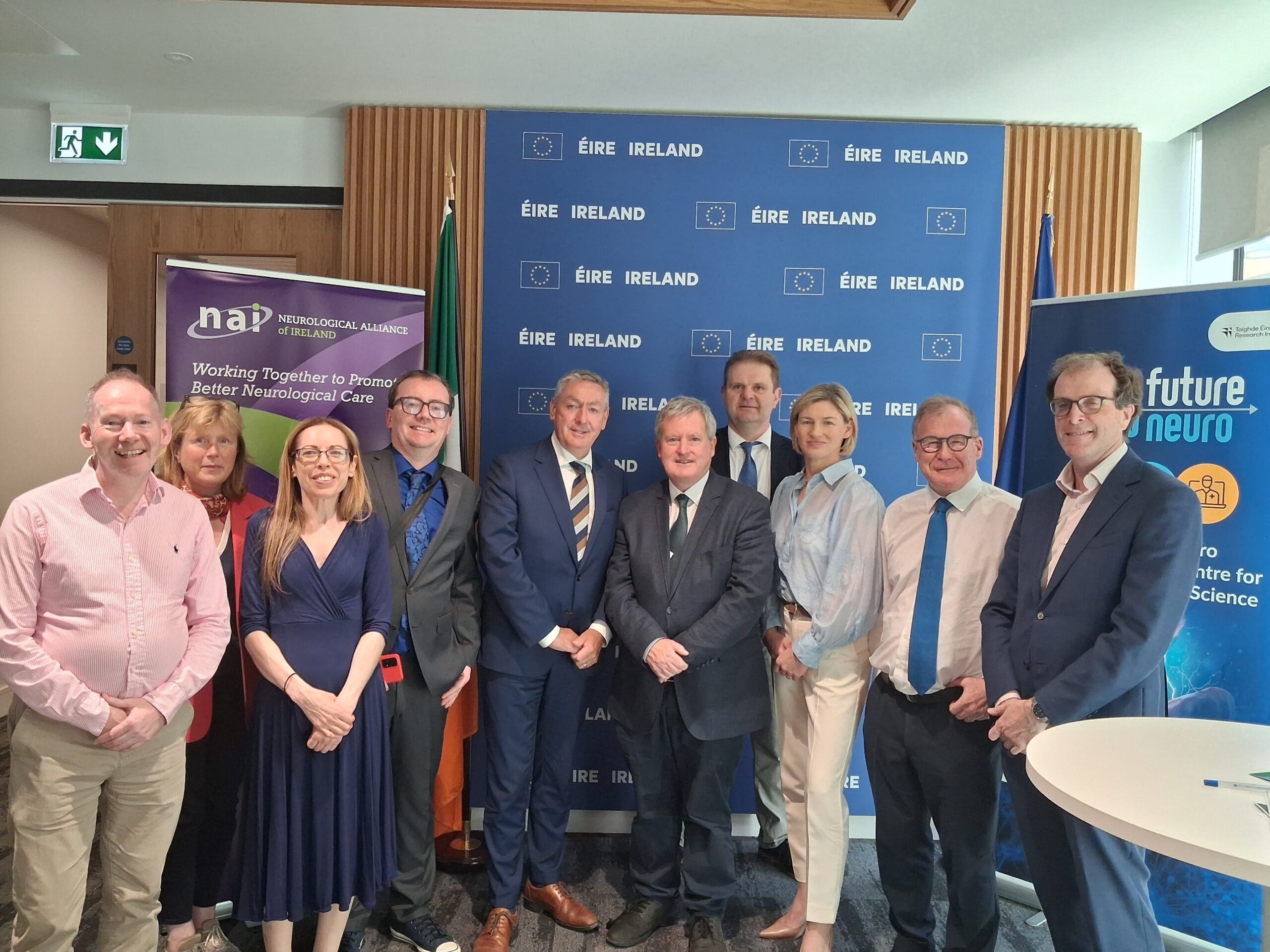 Chronic Pain Ireland's Membership and Engagement Officer alongside MEP Billy Kelleher, Minister Kieran O’Donnell and TD Colm Burke, plus various attendees.